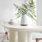 Mesa de comedor ovalada de 72 pulgadas con acabado efecto hormigón y base de doble pedestal
